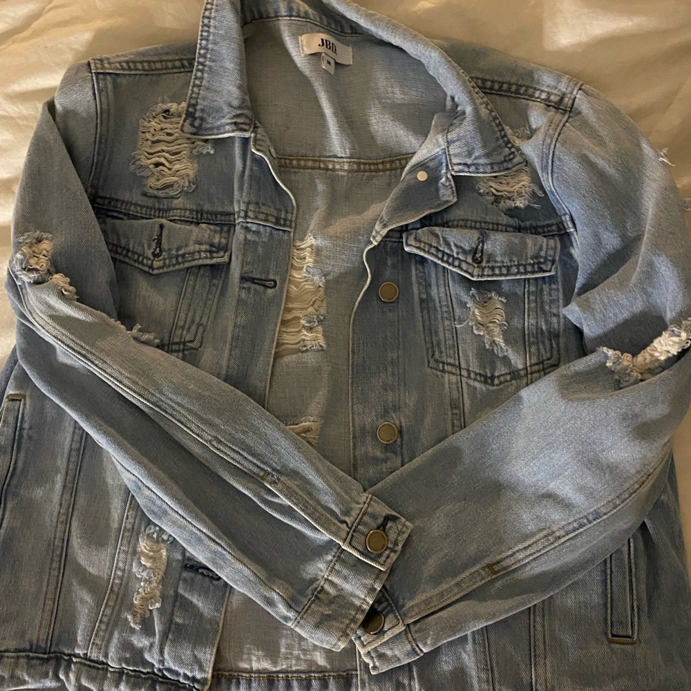 Destroyed denim jacket
